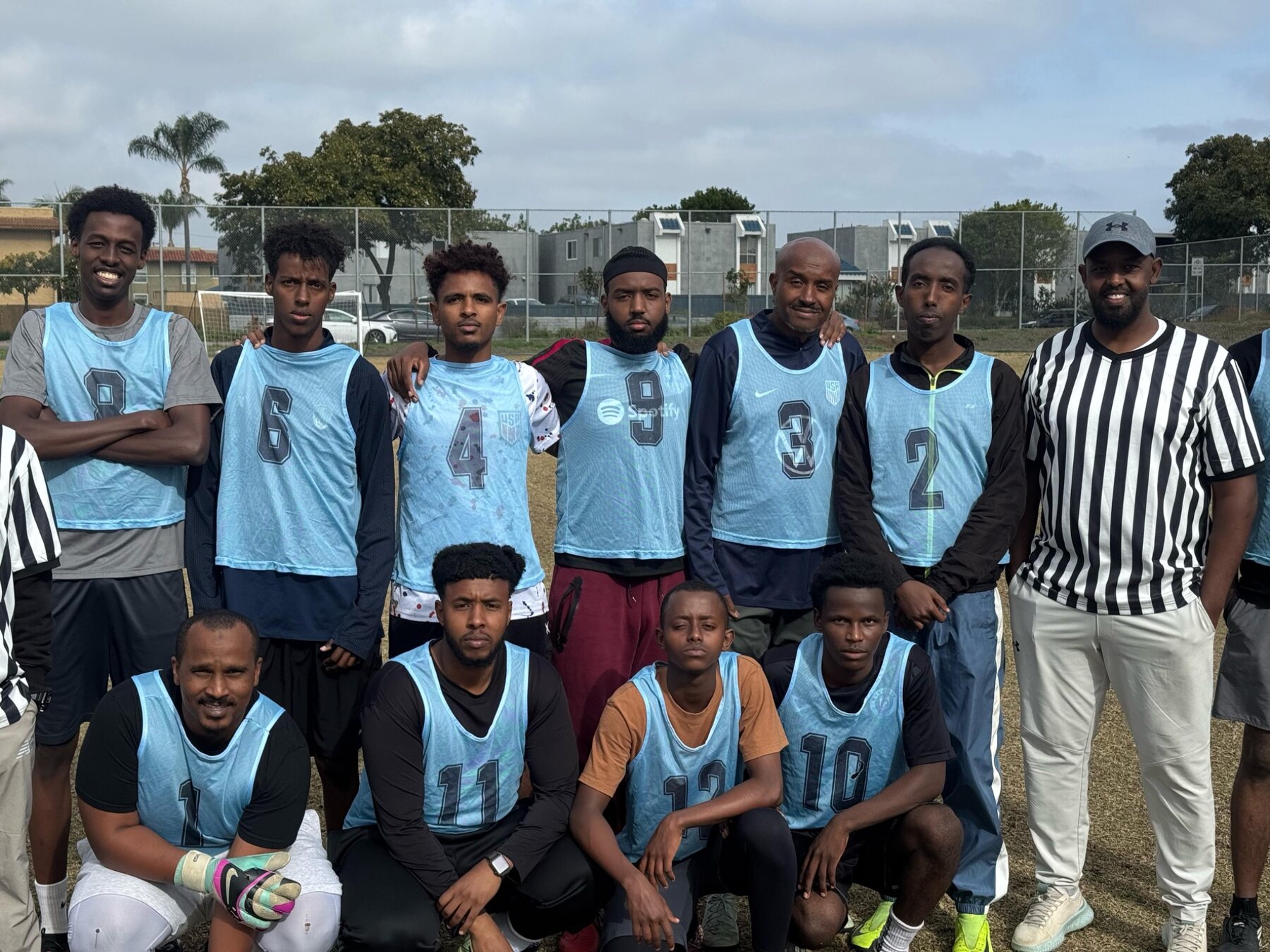Sky blue tournament team with an official
